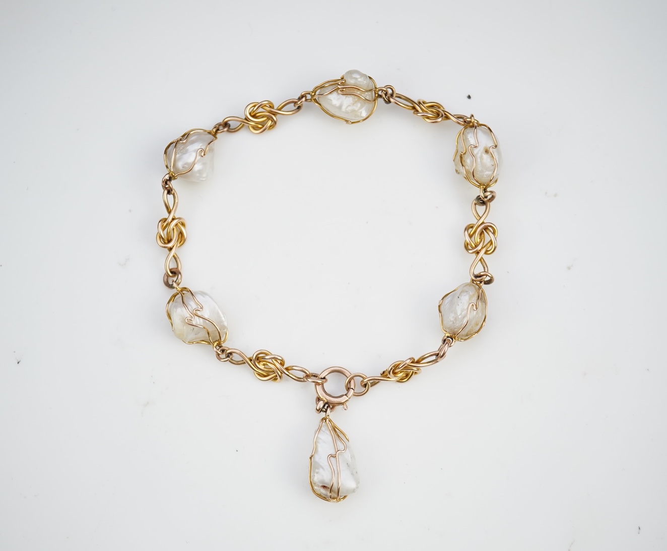 An unusual gold and pearl bracelet, early 20th century